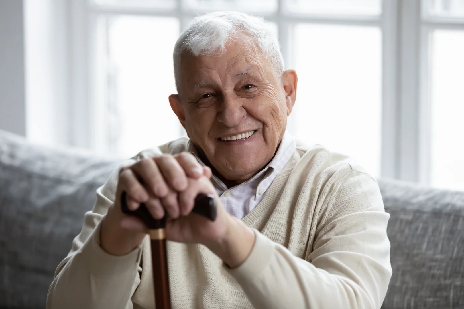 Patient finally comfortable smiling again after full mouth implant treatment